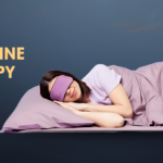 Women resting in bed, blindfolded during ketamine therapy