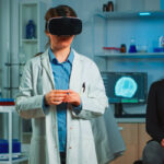 Two individuals in a lab wearing virtual reality glasses, engaged in an immersive digital experience